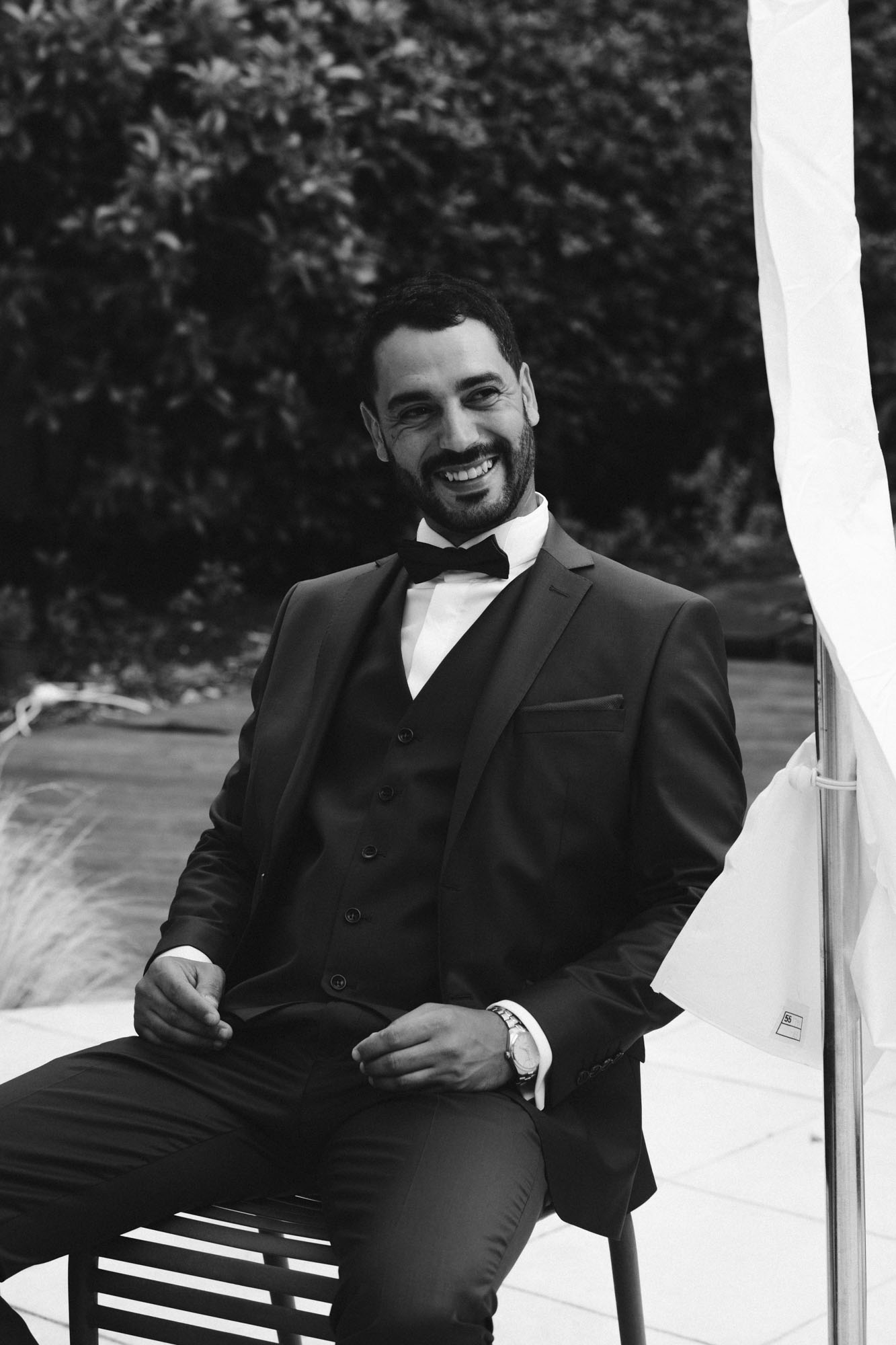 Wedding in Arcachon, France: groom portrait while he waits for his bride to be ready