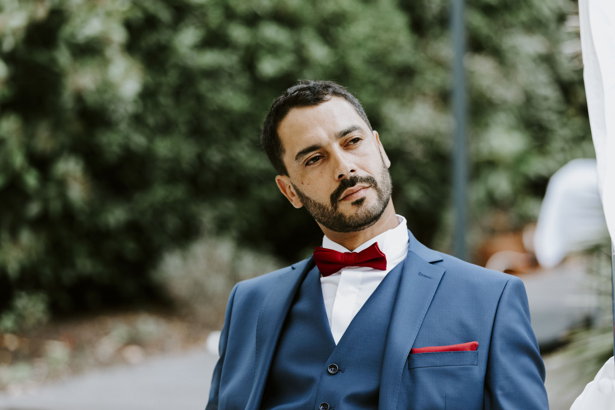 Wedding in Arcachon, France: groom portrait while he waits for his bride to be ready