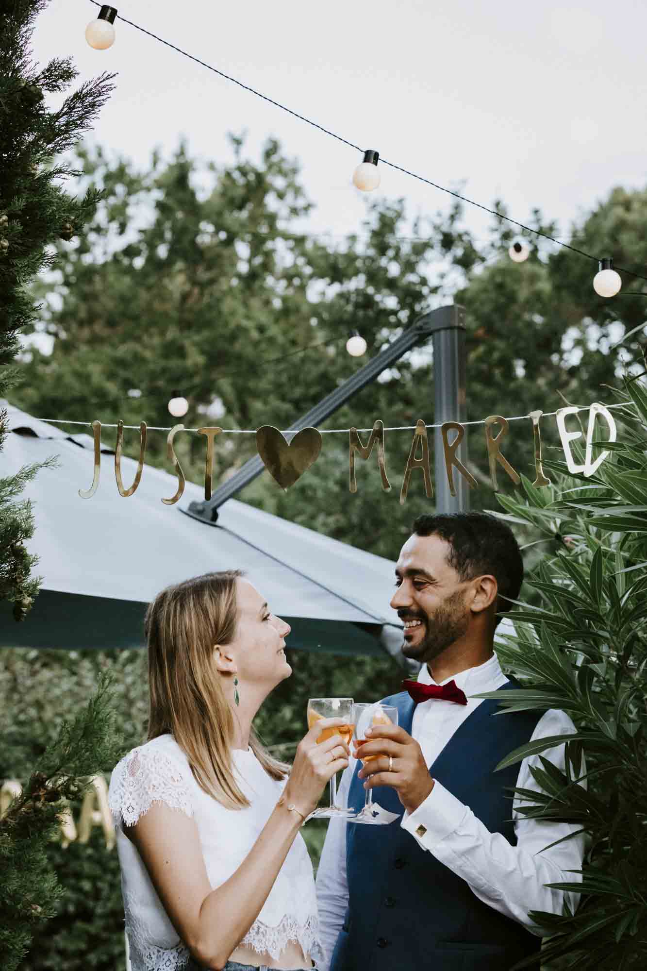 Bordeaux wedding photographer: this Arcachon bride and groom have a toast under the 