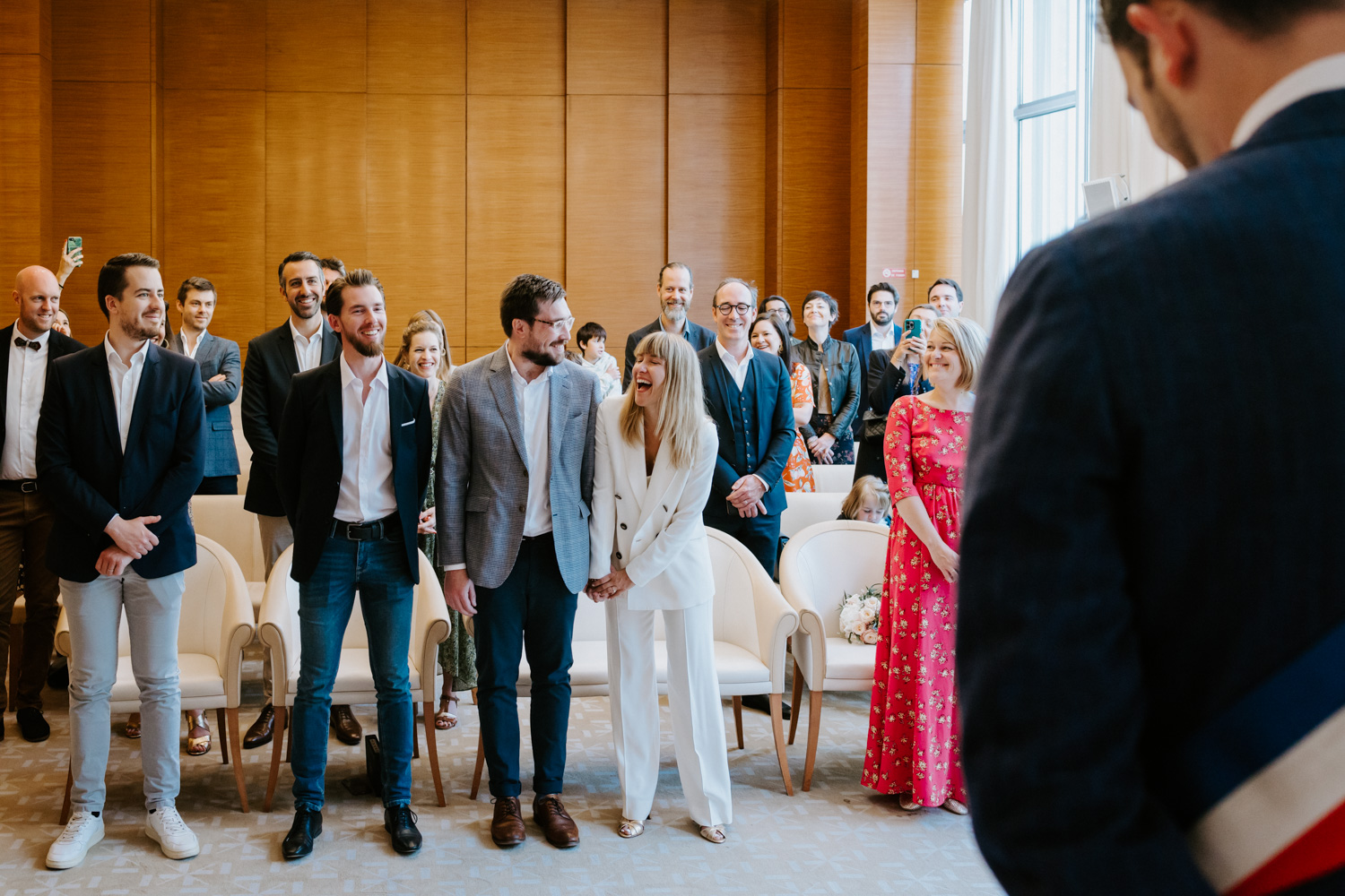 Paris wedding, bride and groom are laughing